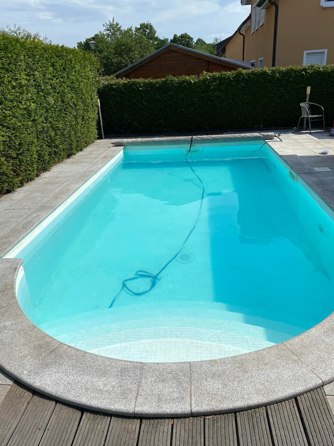 Clean residential pool after service